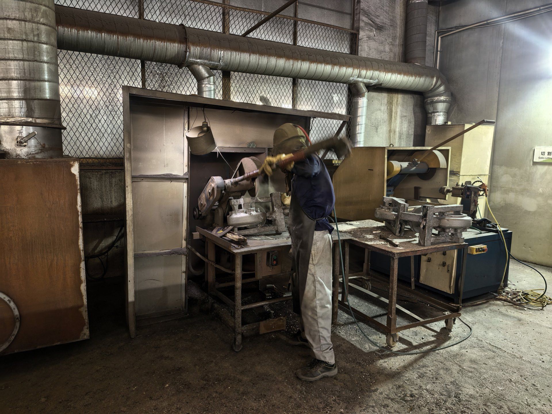 Cutting and Grinding Workshop - Worker Removing Gates and Risers with Abrasive Cutting Equipment | Huayong Metal